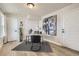 Bright home office features a stylish desk, modern decor, and ample storage space in a well-lit environment at 128 E Douglas St, Superior, CO 80027