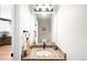 Bathroom with decorative mirror and vanity at 9481 Longstone Dr, Parker, CO 80134