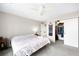 Bedroom with plush carpeting, ceiling fan and a closet at 9481 Longstone Dr, Parker, CO 80134