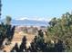 Scenic view of snow-capped mountains from this homes landscape at 9481 Longstone Dr, Parker, CO 80134