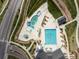 Aerial view of the community pool area, showing swimming pool, surrounding landscaping and amenities at 27110 E Fremont Pl, Aurora, CO 80016