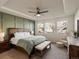 Spacious main bedroom with tray ceilings, accent wall, and lots of bright, natural light at 27110 E Fremont Pl, Aurora, CO 80016
