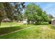 Enjoy the lush green space within this HOA community, enhanced with mature trees and landscaping at 8879 W Floyd Ave, Lakewood, CO 80227