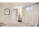 Bedroom featuring a closet, mirror, and natural light at 6494 W 85Th Ave, Arvada, CO 80003