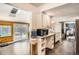 Spacious kitchen with sleek countertops, modern appliances, and an easy access to the backyard at 6494 W 85Th Ave, Arvada, CO 80003