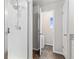 Modern bathroom with a glass shower enclosure, tiled walls, and a neutral color palette at 42741 Ivydel Cir, Elizabeth, CO 80107