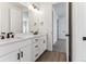 Double vanity bathroom with modern fixtures and ample counter space at 4993 Hickory Oaks St, Castle Rock, CO 80104