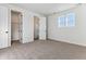 Bright bedroom with carpet flooring and walk-in closet at 4993 Hickory Oaks St, Castle Rock, CO 80104