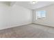 Simple bedroom with neutral wall paint and carpet flooring at 4993 Hickory Oaks St, Castle Rock, CO 80104