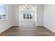 Bright dining room with hardwood floors and a chandelier at 4993 Hickory Oaks St, Castle Rock, CO 80104