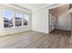 Spacious living room with large windows and hardwood floors at 4993 Hickory Oaks St, Castle Rock, CO 80104