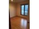 Bright bedroom with hardwood floors, large windows, and ample natural light at 31270 John Wallace Rd # 310, Evergreen, CO 80439