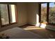 Serene bedroom featuring large windows, offering beautiful views and allowing natural light to fill the room at 31270 John Wallace Rd # 310, Evergreen, CO 80439