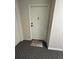 An interior view of a front door with a welcome mat at 31270 John Wallace Rd # 310, Evergreen, CO 80439