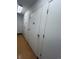 Hallway with storage unit doors at 31270 John Wallace Rd # 310, Evergreen, CO 80439