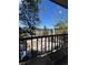 Balcony view showcases construction and scenic landscape beyond at 31270 John Wallace Rd # 310, Evergreen, CO 80439