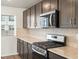 Modern kitchen with stainless steel appliances and granite countertops at 14411 Pansy Loop, Morrison, CO 80465