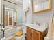 Cozy bathroom with toilet, vanity, and combined shower/tub at 4182 S Bahama St, Aurora, CO 80013