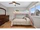 Bedroom with a bunk bed, dresser, and hardwood floors at 7636 S Eaton Way, Littleton, CO 80128