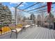 Relaxing deck with pergola, seating, and views of the backyard at 7636 S Eaton Way, Littleton, CO 80128