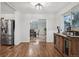 Kitchen with stainless steel appliances and wood cabinets at 7636 S Eaton Way, Littleton, CO 80128