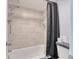 This bathroom features a shower over tub and chrome shower head at 5300 E Cherry Creek South Dr # 804, Denver, CO 80246