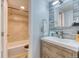 This bathroom features a modern vanity with a vessel sink and gray and white stone backsplash at 5300 E Cherry Creek South Dr # 804, Denver, CO 80246