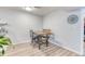 Dining area with a wooden table and chairs next to kitchen at 5300 E Cherry Creek South Dr # 804, Denver, CO 80246