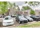 Apartment building featuring common parking and small balconies at 5300 E Cherry Creek South Dr # 804, Denver, CO 80246