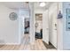 A bright hallway view showcasing the entryway to the home and a walk-in closet at 5300 E Cherry Creek South Dr # 804, Denver, CO 80246