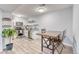 Bright kitchen features stainless steel appliances, gray granite countertops, and a wooden table with chairs at 5300 E Cherry Creek South Dr # 804, Denver, CO 80246