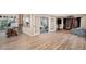 Spacious, finished basement with double doors and wood laminate flooring at 5855 Saddle Creek Trl, Parker, CO 80134