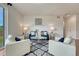 Well-lit living room showcasing modern decor, a comfortable seating area, and an inviting atmosphere at 612 Blue Teal Dr, Castle Rock, CO 80104