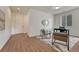 Comfortable home office with natural light, neutral walls, and wood flooring at 612 Blue Teal Dr, Castle Rock, CO 80104