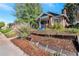 Street view of home's exterior shows landscaping and inviting front entrance at 3336 N Saint Paul St, Denver, CO 80205