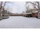 Expansive, fenced backyard, complete with a covered patio, perfect for outdoor enjoyment at 7835 Nelson St, Arvada, CO 80005