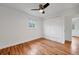 Bedroom with hardwood floors, closet, and window providing natural light at 6765 W 33Rd Ave, Wheat Ridge, CO 80033