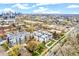 Stunning aerial view of townhomes, landscaping and Denver's cityscape in the distance at 2726 Federal Blvd # 1, Denver, CO 80211