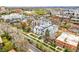 Aerial view showcases new construction of townhomes nestled within a lively cityscape at 2726 Federal Blvd # 1, Denver, CO 80211