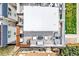 Overhead of rooftop deck featuring outdoor seating, dining, and grilling with nearby landscaping at 2726 Federal Blvd # 1, Denver, CO 80211