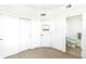 Bedroom with closet, ensuite bathroom, and neutral color scheme at 2726 Federal Blvd # 1, Denver, CO 80211