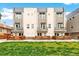 Modern multi-Gathering home features balconies, contemporary design, and well-maintained landscaping at 2726 Federal Blvd # 1, Denver, CO 80211