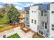 New construction townhome boasts a contemporary facade, and private balconies at 2726 Federal Blvd # 1, Denver, CO 80211