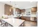 Modern kitchen with sleek cabinets, stainless steel appliances, and a large island at 2726 Federal Blvd # 1, Denver, CO 80211