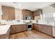 Gourmet kitchen featuring modern appliances, ample counter space, and stylish cabinetry at 2726 Federal Blvd # 1, Denver, CO 80211