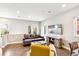A cozy living room with a large flat screen television and modern decor at 2726 Federal Blvd # 1, Denver, CO 80211