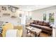 Comfortable living room with hardwood floors and lots of natural light at 2726 Federal Blvd # 1, Denver, CO 80211