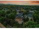 Panoramic aerial view of a lush, green neighborhood highlighting the home and its serene surroundings at 7472 S Utica St, Littleton, CO 80128