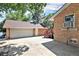 Spacious detached garage offering ample parking and storage space, plus side entry at 11940 W Independence Ave, Lakewood, CO 80401