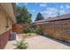Enclosed backyard featuring a wooden fence offering privacy, with ample space for landscaping and outdoor enjoyment at 4233 Shoshone St, Denver, CO 80211
